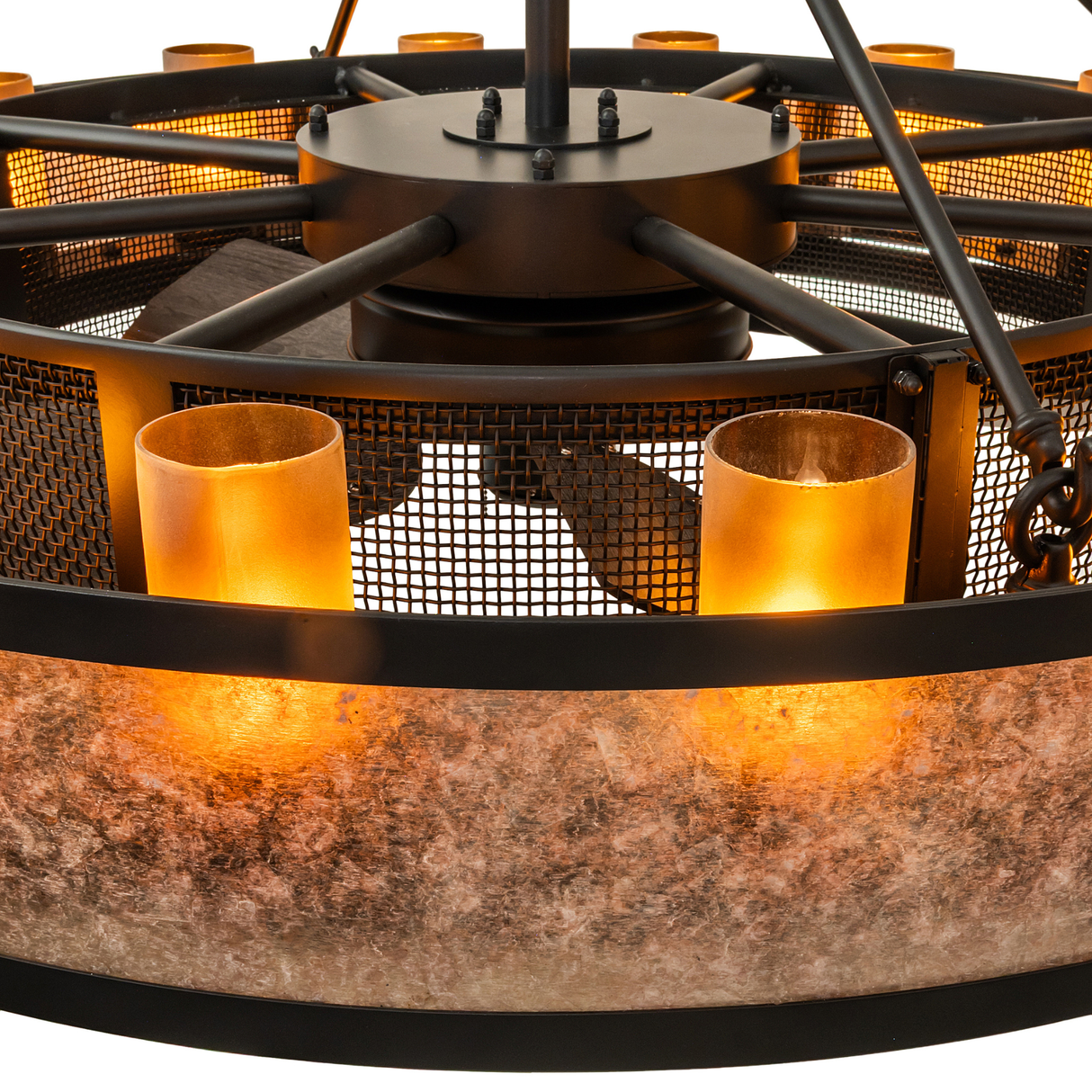 Detailed view of candle-style amber mica shades on Smythe Craftsman chandelier fan.