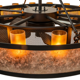 Detailed view of candle-style amber mica shades on Smythe Craftsman chandelier fan.