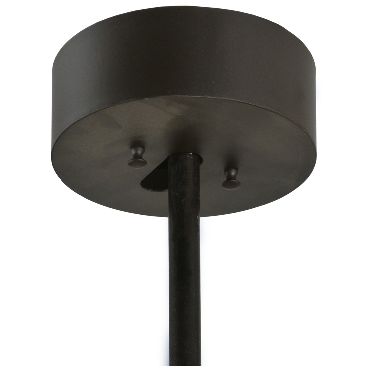 Ceiling canopy detail showing bronze finish and downrod mount.