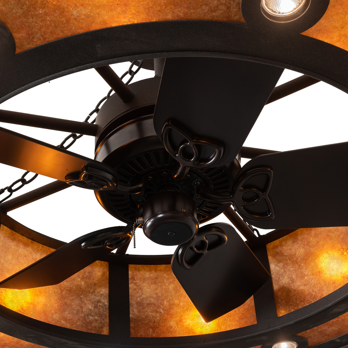 Close-up of fan motor and blades surrounded by glowing amber panels.