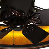 Close-up of bronze fan motor housing with amber mica reflection.