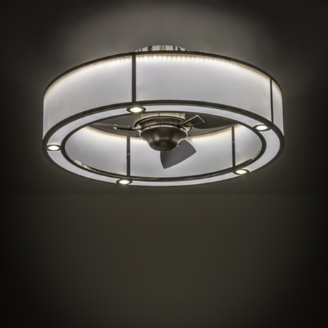 Ambient lit view of stainless chandel-air illuminating a dark room.