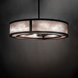 Smythe Craftsman chandelier fan casting soft light in elegant dark wall setting.