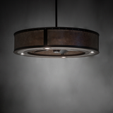 Smythe Craftsman chandelier fan emitting faint golden light in moody setting.