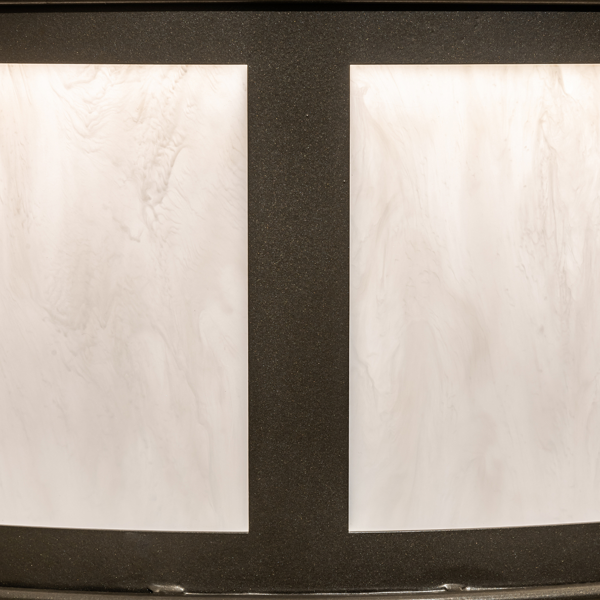 Detailed view of handcrafted Whitestone Idalight diffuser and bronze framework.