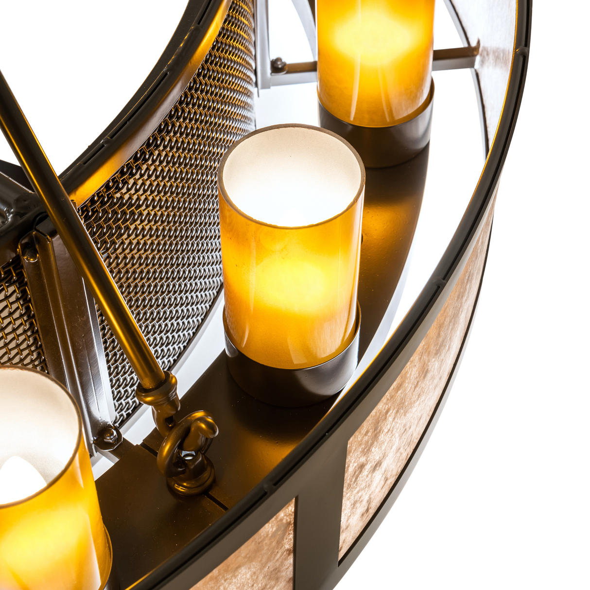 Detail showing amber glass candle shades and bronze frame finish.