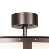 Close-up of ceiling canopy in mahogany bronze finish above diffuser.