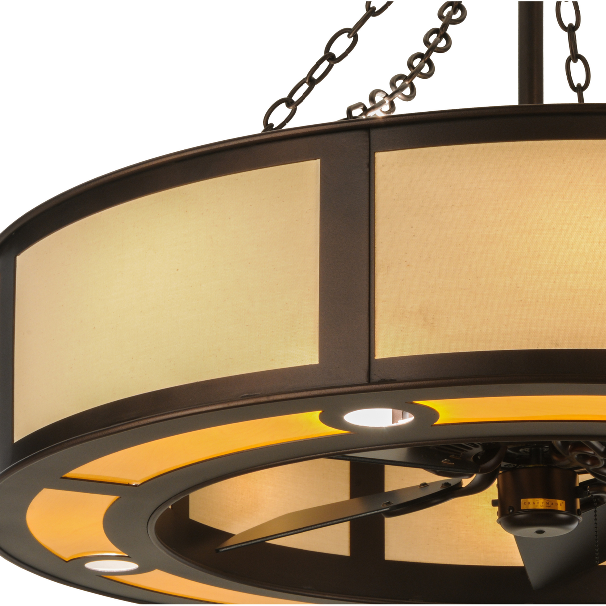 Closeup lit view highlighting textured diffuser and fan center.