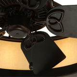 Close-up of fan blades and motor detail with warm light glow.