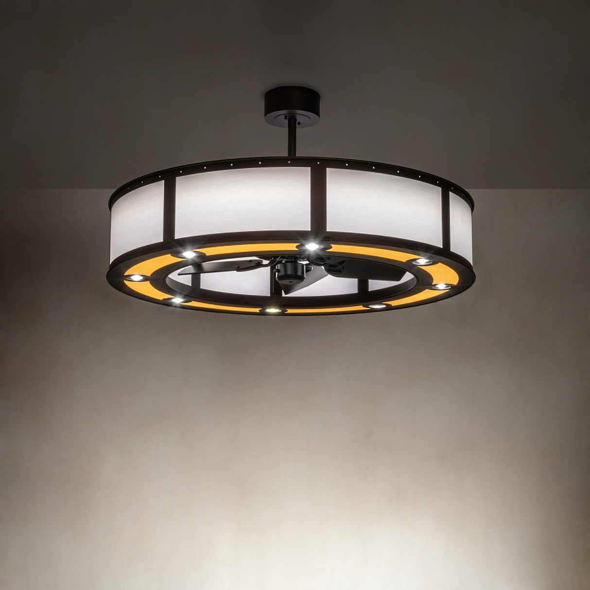 Ceiling-mounted Chandel-Air softly illuminating a neutral-toned wall.