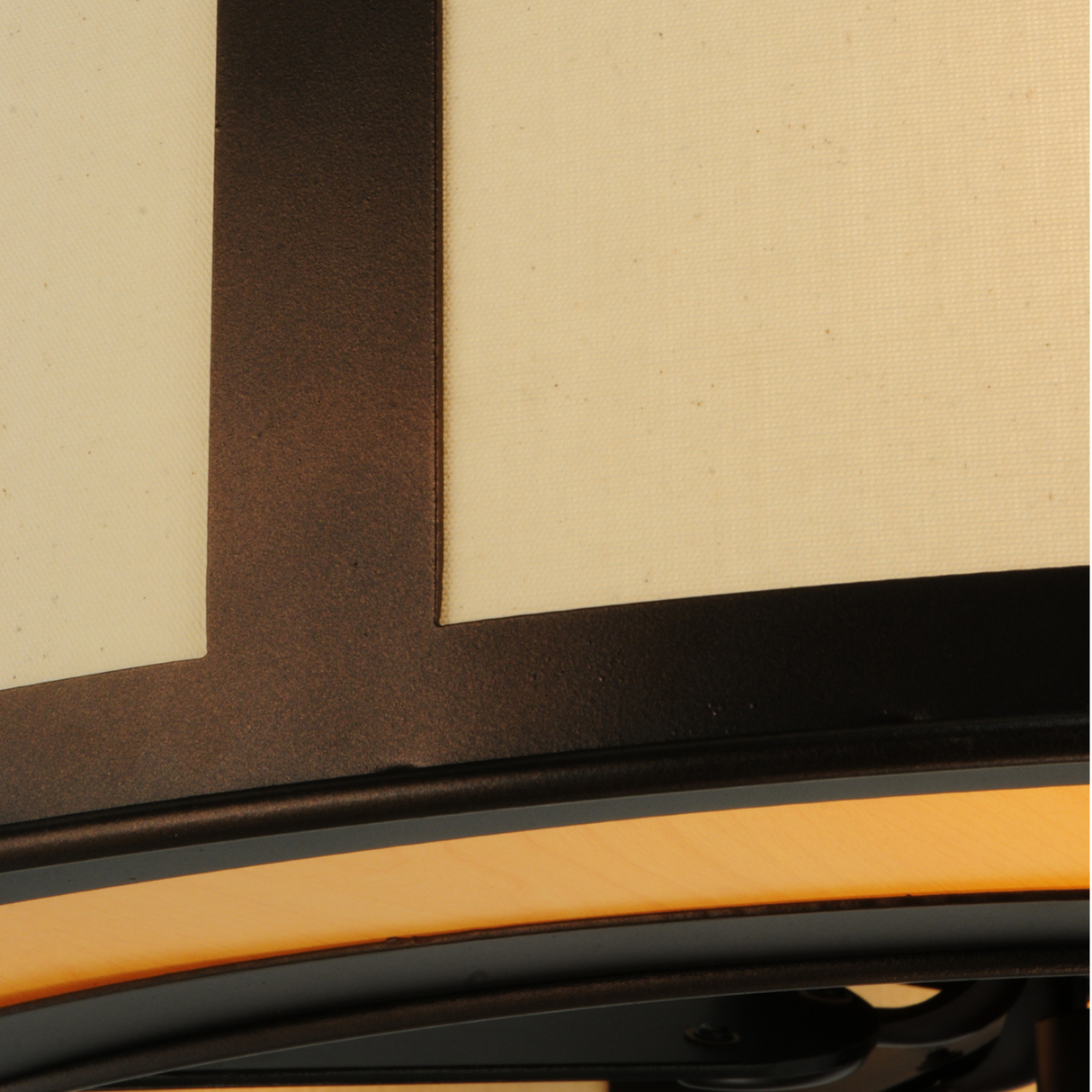 Close-up of fabric shade and maplewood panel design.