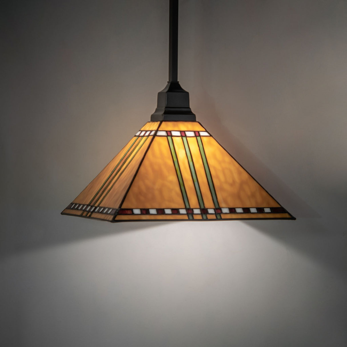 Illuminated Square Prairie Corn Pendant casting warm light.