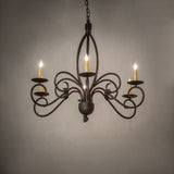 Squire six light chandelier shown in ambient room setting.