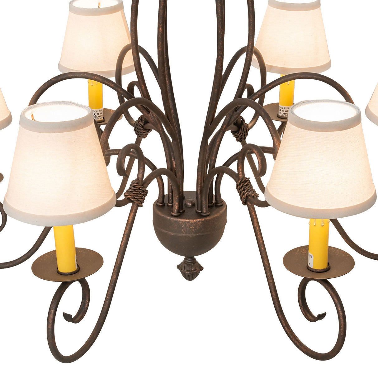 Closeup of Squire chandelier center with twisted iron scrollwork.