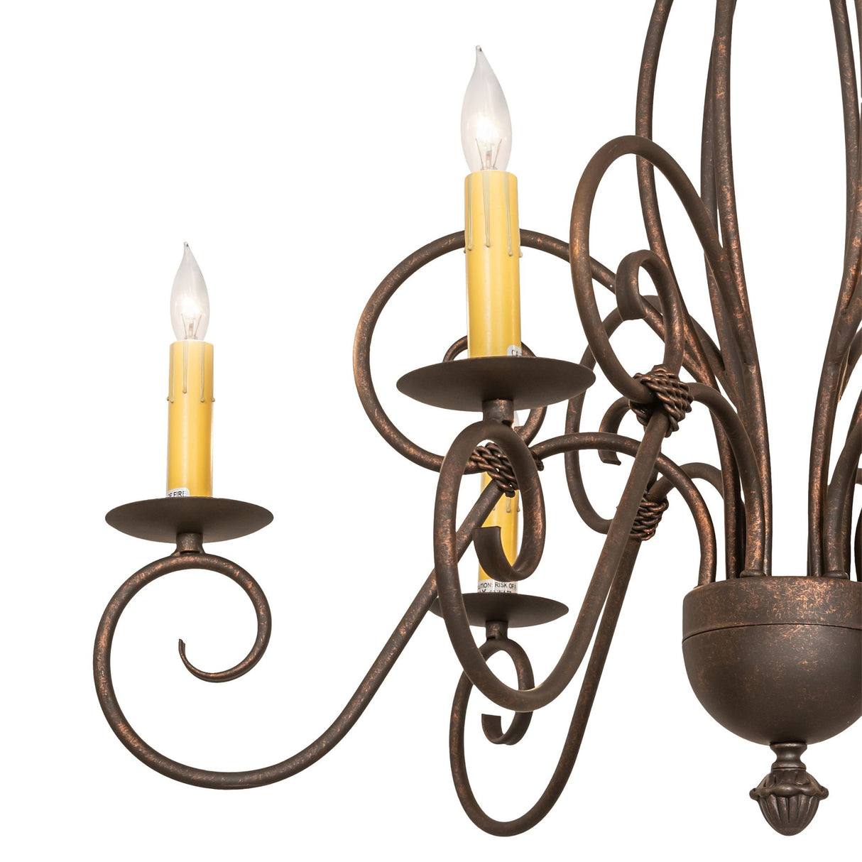 Close-up of chandelier scrollwork and faux candlelight bobeche.
