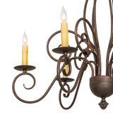 Close-up of chandelier scrollwork and faux candlelight bobeche.