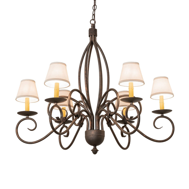 Squire six light chandelier illuminated with white fabric shades.