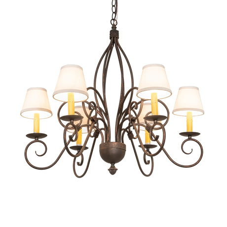 Lit view of 6-light chandelier with off-white shades glowing, gilded tobacco finish.