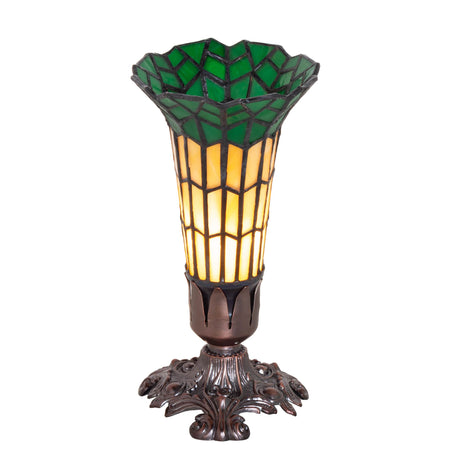 Illuminated green and amber stained glass pond lily lamp.