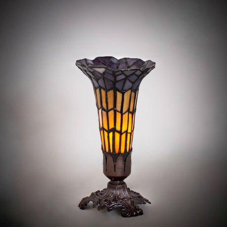 Stained glass Pond Lily Victorian accent lamp illuminated to showcase its warm glow.