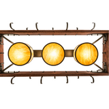 Bottom view of Steamboat 3-light chandelier showing illuminated round diffusers.