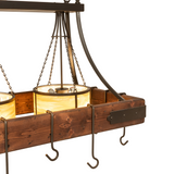 Close-up of Steamboat pot rack wood frame with glowing glass shade.