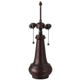 Close-up of the dark brown Sutter table lamp base with two light fixtures.