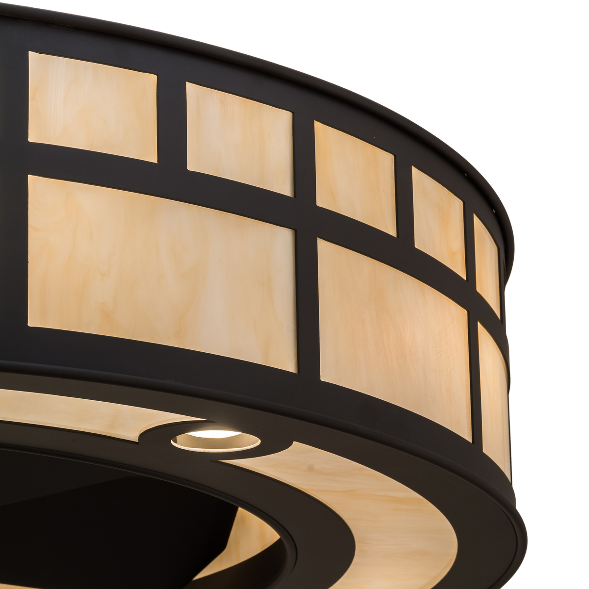 Closeup lit view showing warm Idalight tone and fan detail.