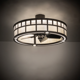 T Mission Chandel-Air softly illuminating a room with warm bronze glow.