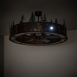 Elegant warm-lit chandelier fan showcasing detailed pine forest silhouette design.