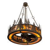Bottom angled lit view showing pine silhouettes and warm amber illumination.