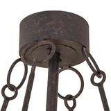 Ceiling canopy detail with rustic iron finish and ring supports.