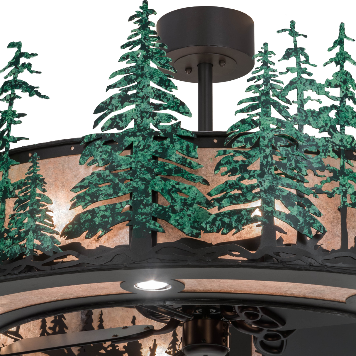 Closeup lit angle showing pine tree cutouts and lighting texture.