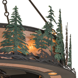 Closeup of green pine tree accents and warm mica panel texture.