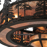 Closeup view of mica diffuser and pine silhouette detailing.
