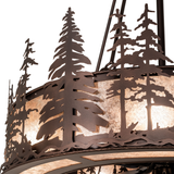 Close-up of pine tree metalwork with glowing mica background.