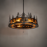Tall Pines Chandel-Air fully lit in dark room showing warm amber glow and pine silhouettes.