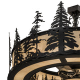 Detailed lit view focusing on handcrafted tree design and texture.