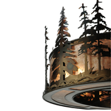 Edge close-up showing metal pine trees and amber mica glow.
