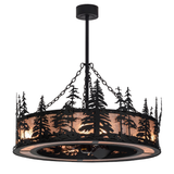 Front angle lit view showing pine tree silhouettes and mica shade.