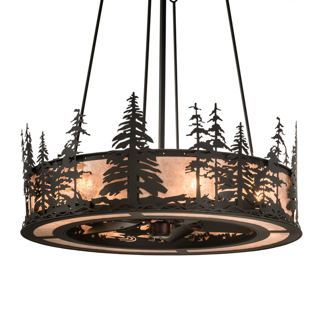 Front angled lit view highlighting silver mica glow and pine tree design.