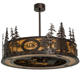 Front unlit view showing detailed pine tree cutouts and ADK emblem.