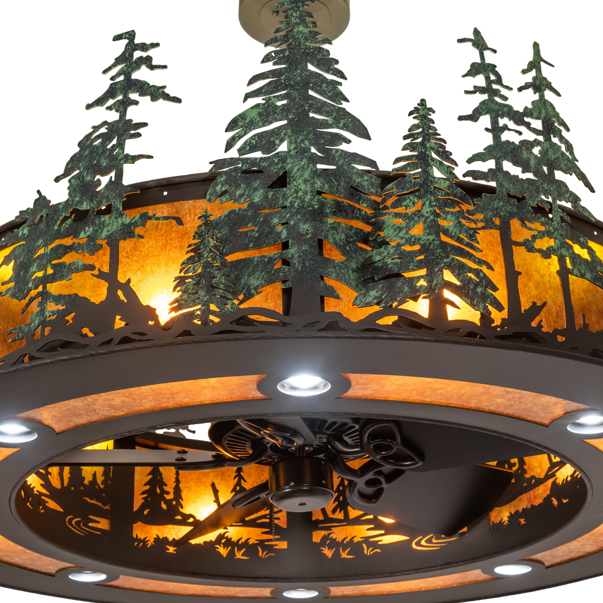 Close-up of green pine tree detailing and amber mica diffuser.