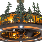 Close-up of green pine tree detailing and amber mica diffuser.