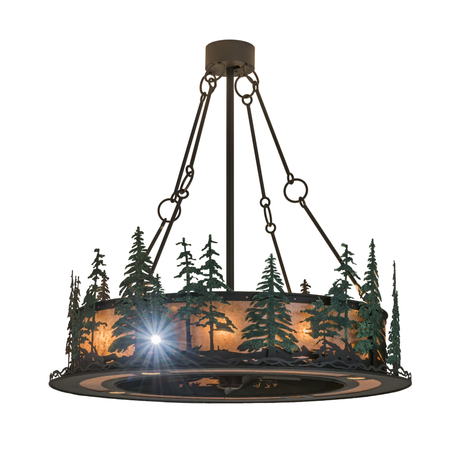 Front view showing glowing Silver Mica shade and pine tree detailing.