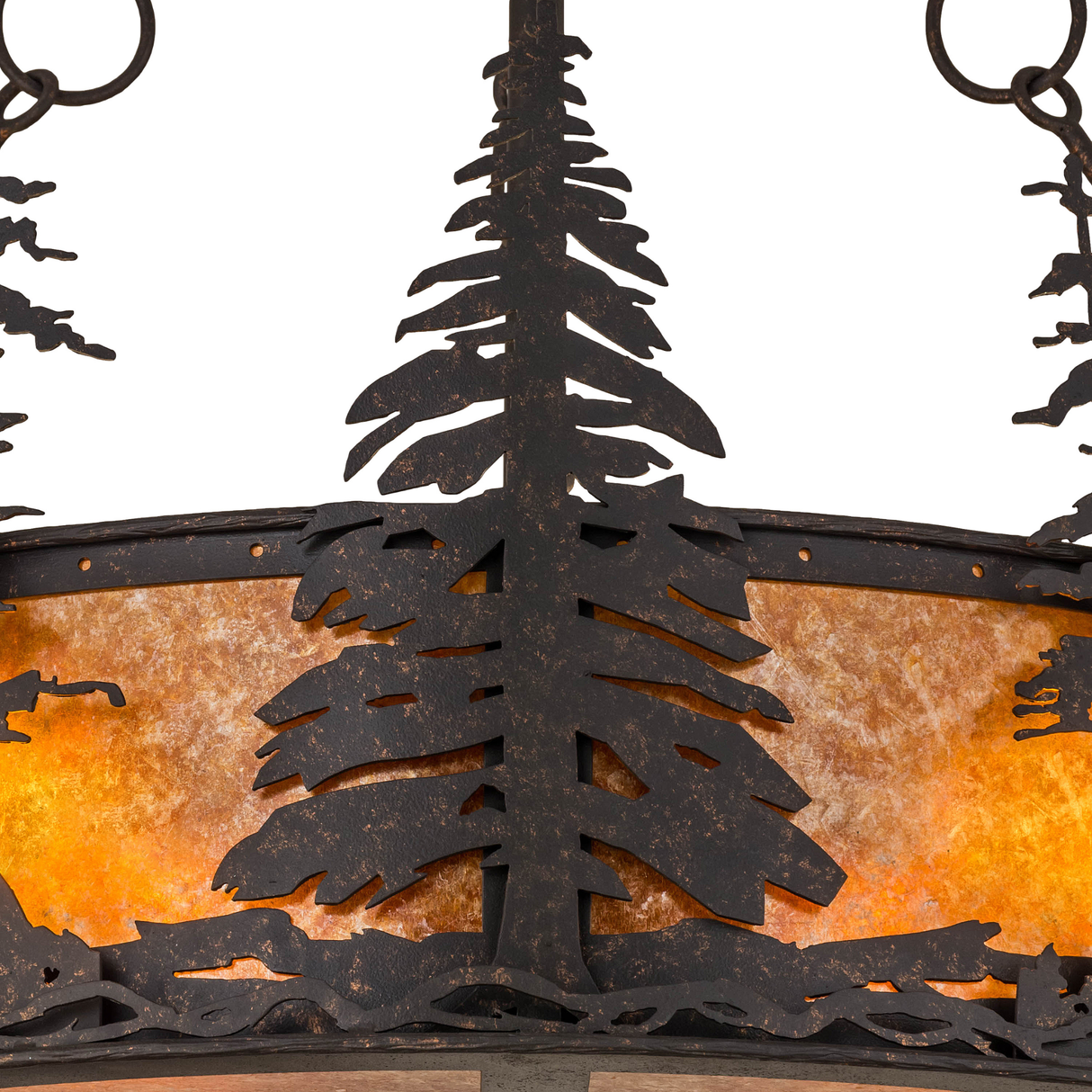 Shade detail showing handcrafted pine silhouettes and amber glow.