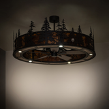 Subtle room lighting view with illuminated pine tree cutouts and warm glow.