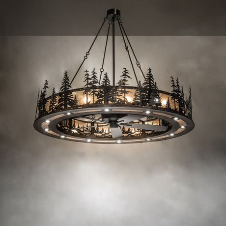 Illuminated chandelier fan casting warm forest-themed glow.