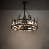 Rustic Tall Pines Chandel-Air casting warm ambient glow in lodge interior.