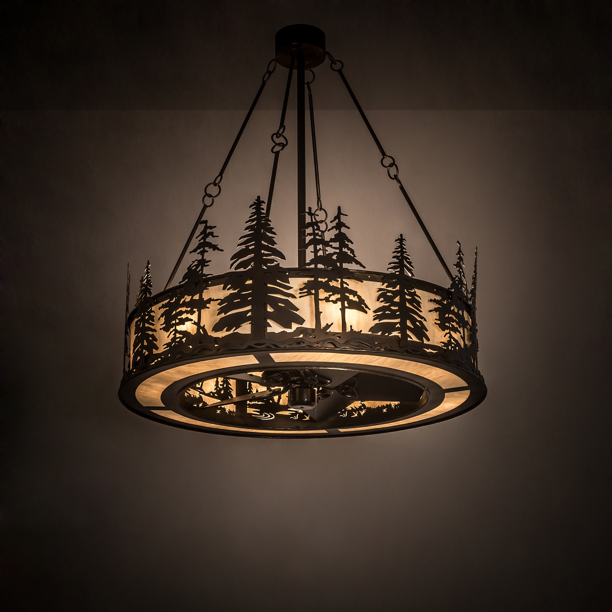 Tall Pines Chandel-Air glowing warmly in a softly lit room.